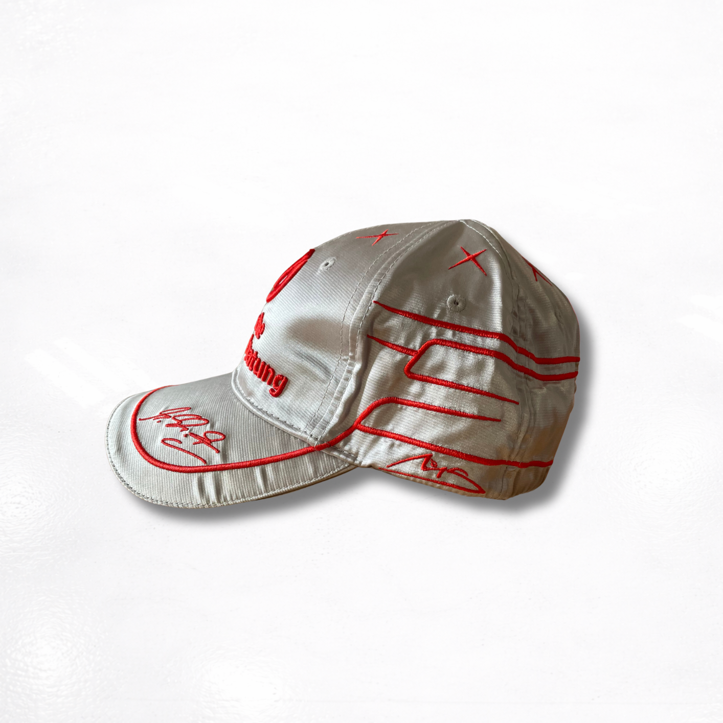 Michael Schumacher's Personal Cap - Mercedes 2011 - Signed